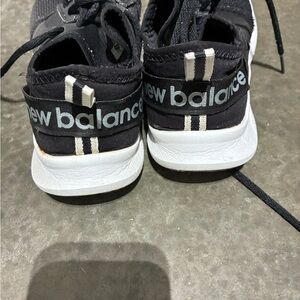 New balance women size 6 black and White Athletic Sneakers